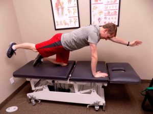 man doing back exercises